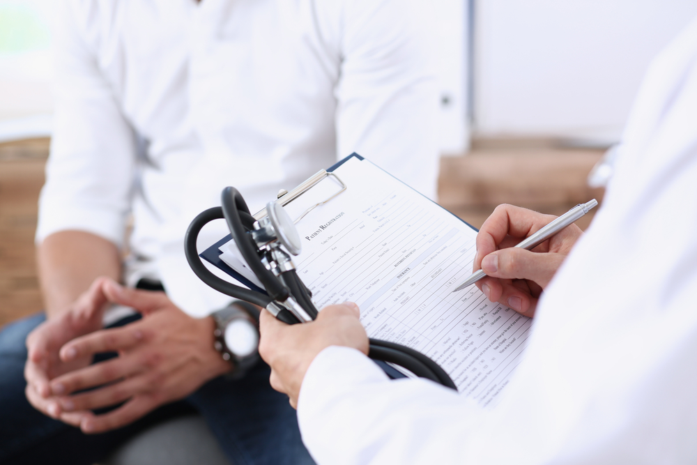 Male,Doctor,Hand,Hold,Silver,Pen,Filling,Patient,History,List Male,Doctor,Hand,Hold,Silver,Pen,Filling,Patient,History,List
