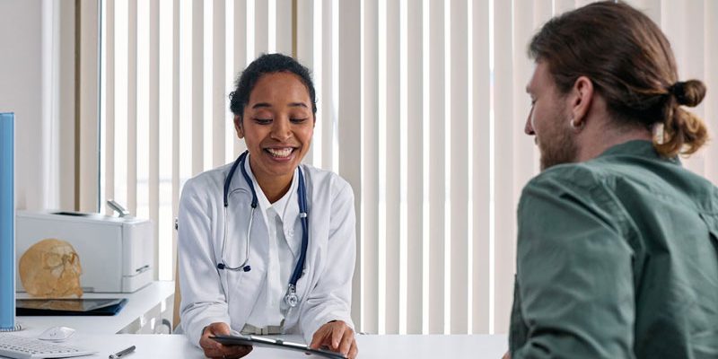 A-Doctor-Talking-with-the-Patient Internal Medicine Doctor