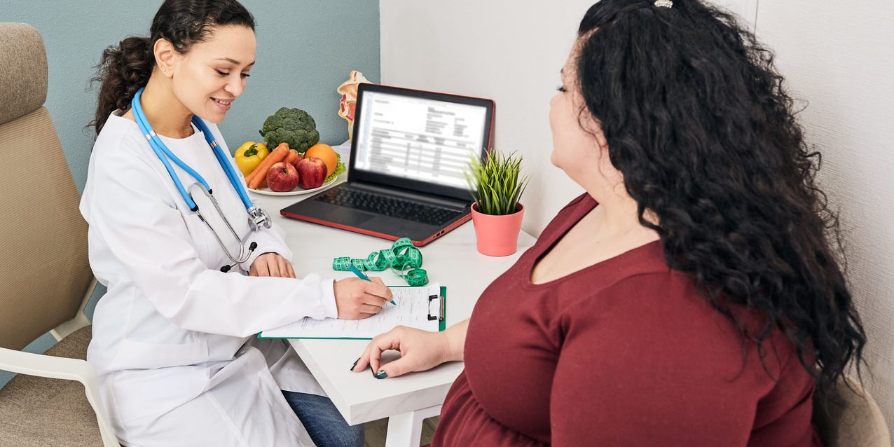 Obese woman at a weight loss clinic for a consultation Weight Loss Clinics