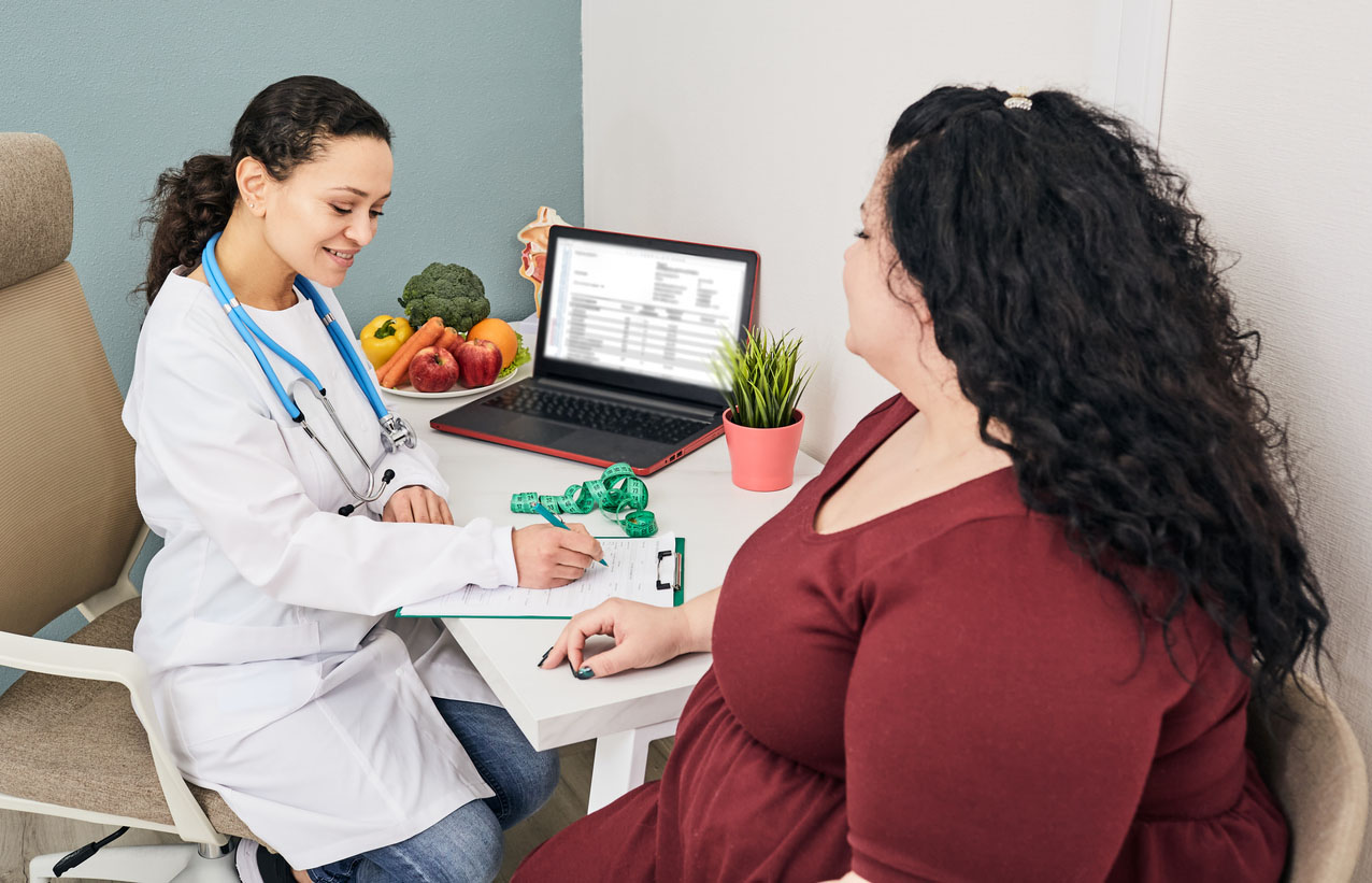 Obese woman at a weight loss clinic for a consultation Weight Loss Clinics