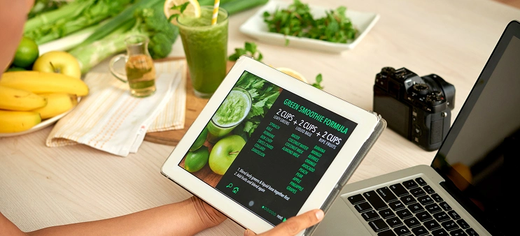tablet with a list of food calorie counts