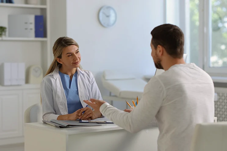 Physician reviewing results with a patient