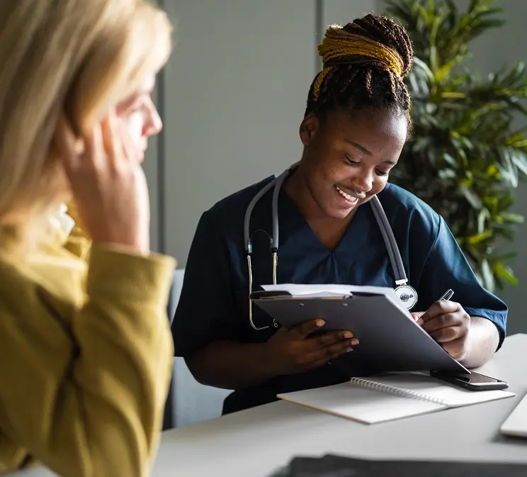 Clinician reviewing a care plan with a patient